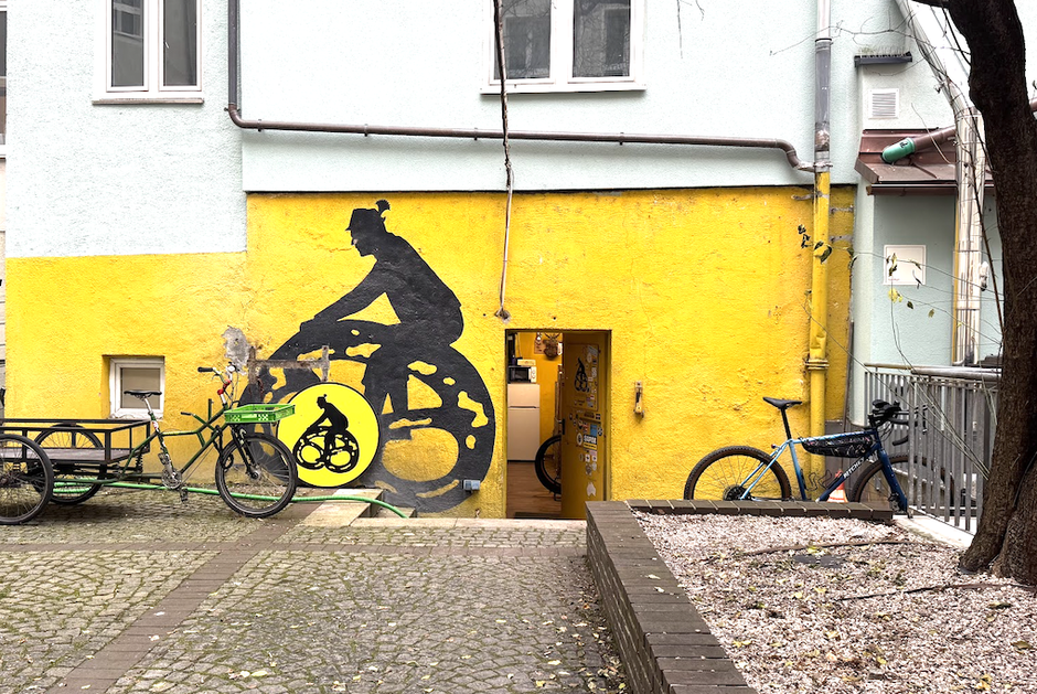 Guten Biken courtyard today, logo wall as back in 2010ish