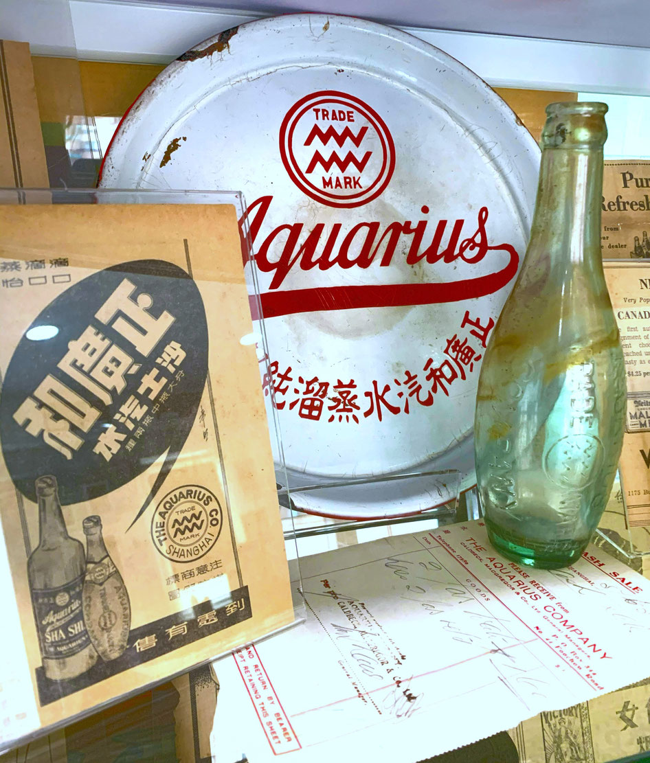 Various artefacts from the Shanghai Aquarius Mineral Water & Beverage Company. From the MOFBA collection.