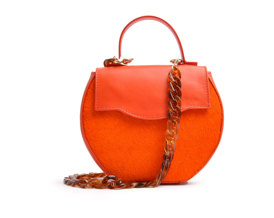 exklusive Dirndltasche in orange, aus echtem Leder mit modischer Acrylkette