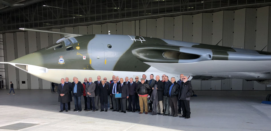 Fine body of men in approved crescent wing formation. With their Victor K1 2 Pointer XH-648 after her renovation at IWM Duxford