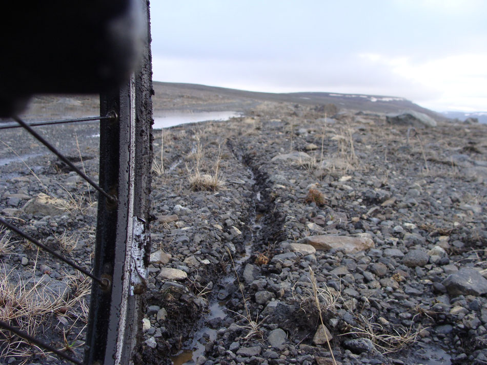 After an already long biking day along the route 901 and 907, we had to cross one last hill. This had been about 22 km. It took us 6.5 h, almost only walking by feet through mud with heavy bikes, hungry and exhausted. Took us 10a.m.-01a.m.