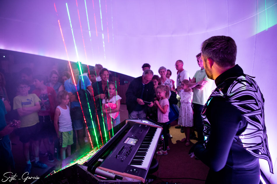 Laser Harp performer, composer & pianist