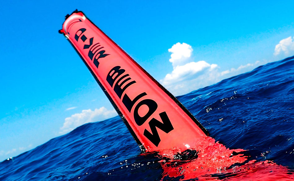 Divemaster_surface_marker_buoy_at_surface_of_Nusa_Penida_waters