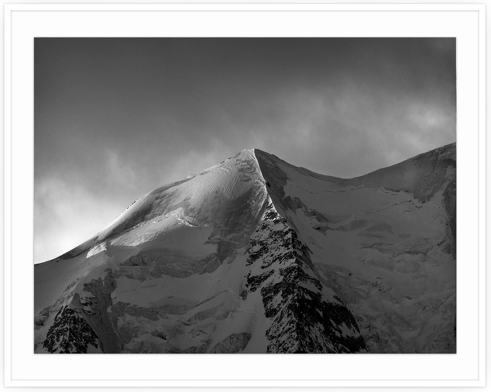 lack and white mountain portrait of Piz Palü in the Bernina Range, Switzerland