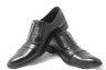 Foto: Maennerschuhe, Symbol fuer maennlichen Coachee