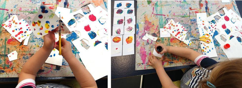 Kind schneidet Papier aus und klebt es auf eine Kunst Memory Karte