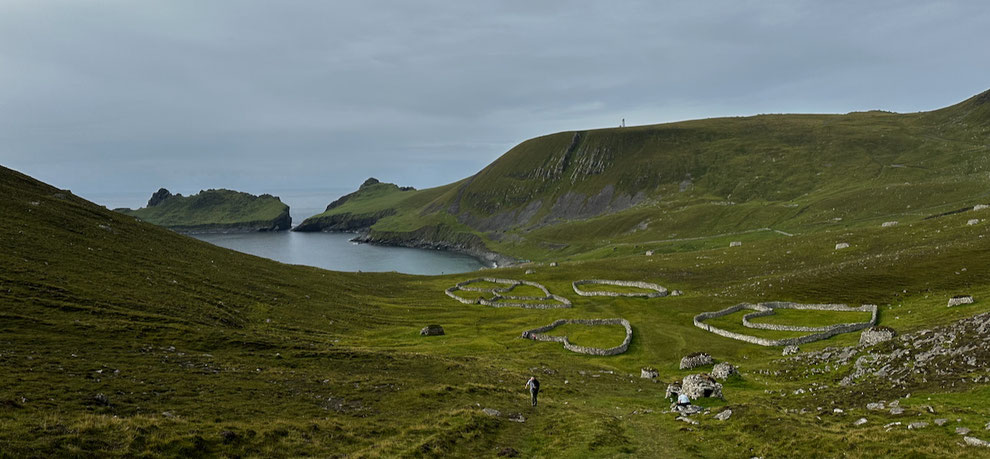 St. Kilda is an ancient volcanic archipelago of four tiny islands the North Atlantic Ocean west of Scotland: View of stone paddocks and storage structures (cleits).