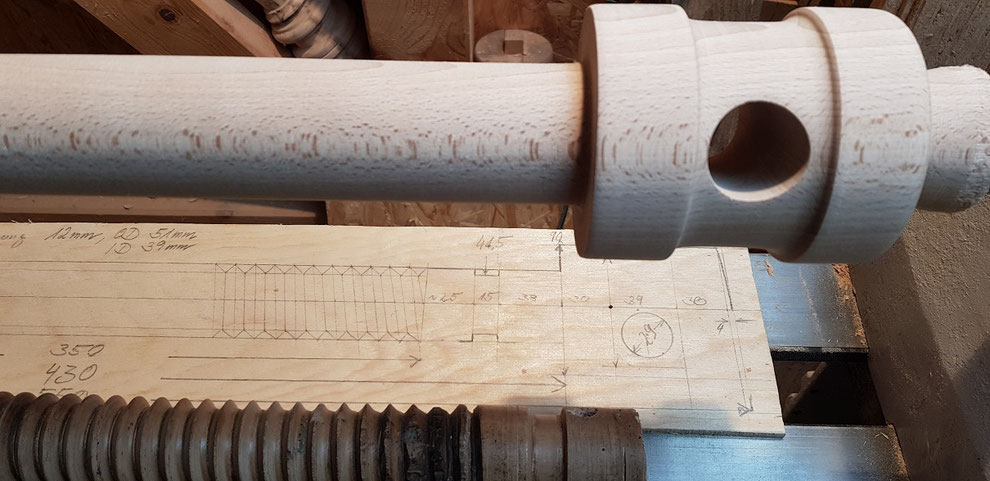 Turning a replica of a wooden vise screw on the lathe.