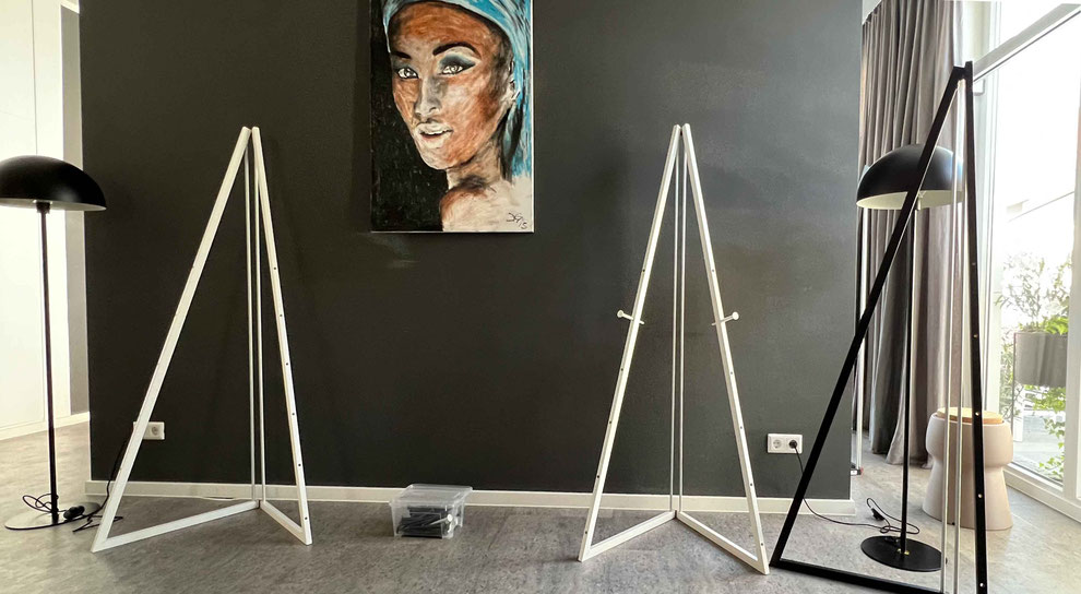 White presentation easel for rent – modern, foldable, and adjustable display stand for events, exhibitions, or business presentations