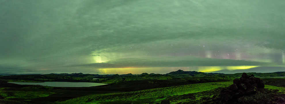 Northern lights over lake Laki in Iceland