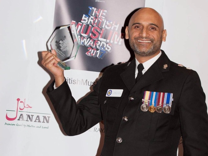 Solihull Police Commander, Chief Superintendent Bas Javid, with the Uniformed Services Person of the Year Award which he received in the British Muslim Awards, January 2017.