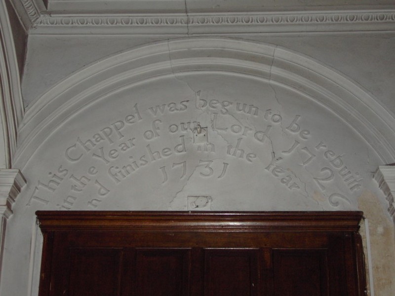 Inscription over the entrance door dating the rebuild to 1726-1731