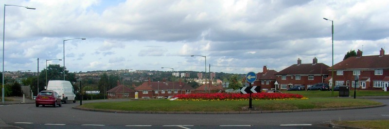 Barnes Hill at the juction with Weoley Castle Road (right) and Senneleys Park Road (left). Quinton lies on the ridge in the distance.