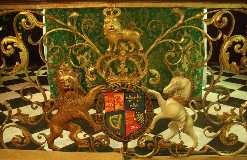 The excellent wrought-iron altar rail of 1743 and that of the chapel at the Bridgeman family seat at Weston-under-Lizard are the only ones in the country to show the royal arms of George II in this position.