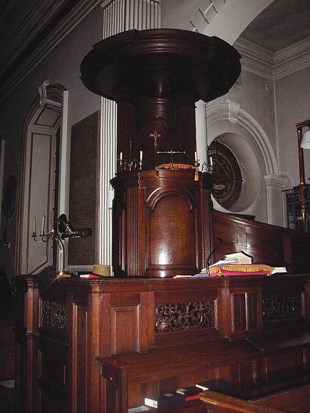 There is a fine and rare triple-decker pulpit with an inlaid sounding board above. It has a seat for the clerk, a reading desk and high pulpit. The woodwork facing the front pews has good carving which also includes the Bridgeman arms. 