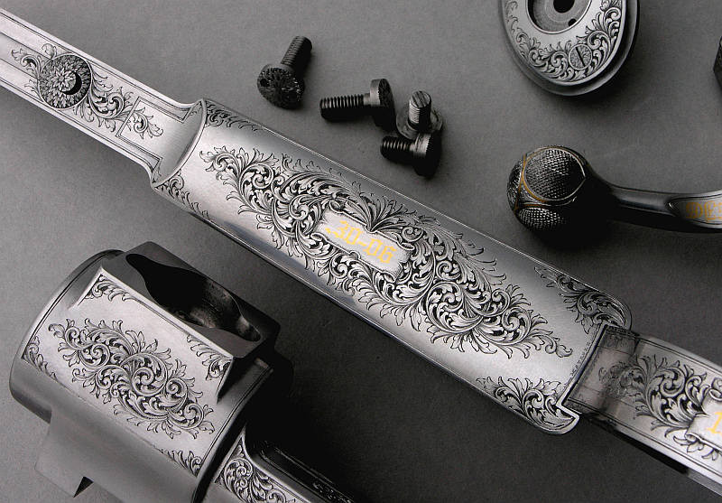 The engraving "in the white" before color case hardening