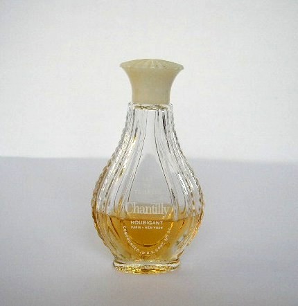 HOUBIGANT : CHANTILLY - EAU DE COLOGNE, SERIGRAPHIE BLANCHE SUR LA MINIATURE. BOUCHON EN BAKELITE IVOIRE VISSE. PROVENANCE USA