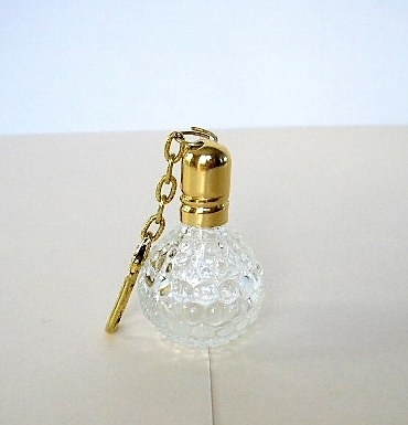 YVES ROCHER : PETIT FLACON "PORTE-CLES" OFFERT VIDE