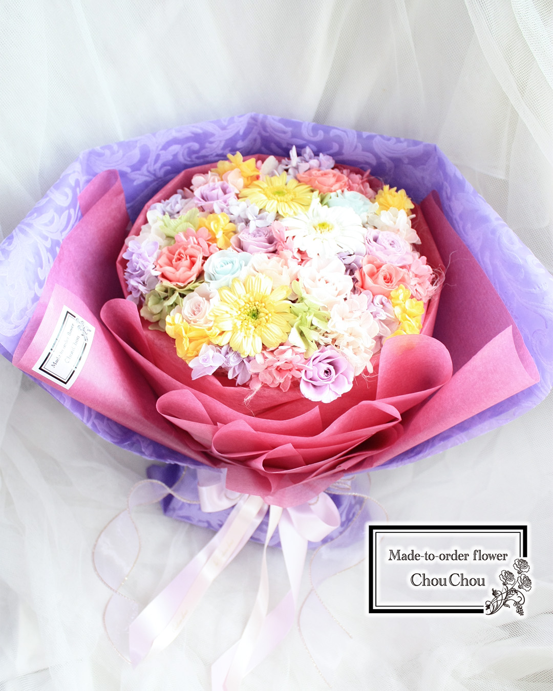 プロポーズ　１２輪の薔薇とガーベラのラプンツェルイメージの花束（プリザーブドフラワー）　東京ディズニーランドホテルへ　　order no 240406