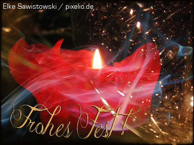 Blider mit weihnachtlicher Kerze und goldem Schriftzug: "Frohes Fest!"
