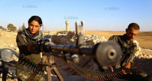 Kurdiske fightere fra YPG-militsen (Committees for the Protection of the Kurdish People) i kamp mod IS