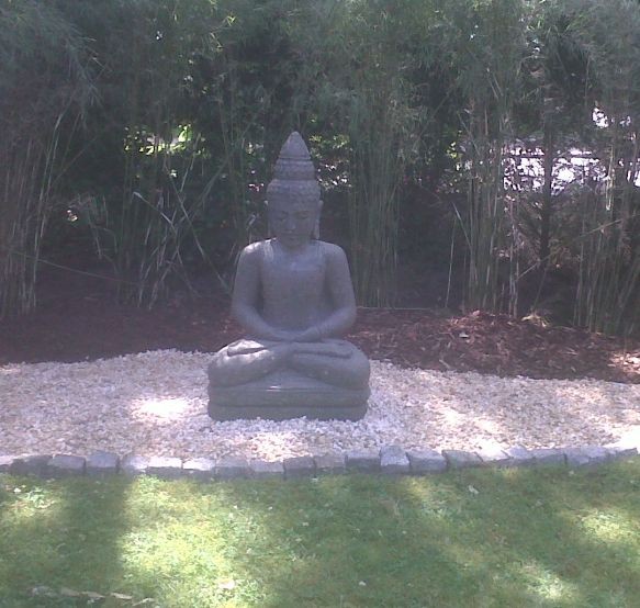 Buddha Statue für den Garten Massage Qigong Hamburg