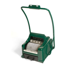 Sole cleaning machine for golf and tennis