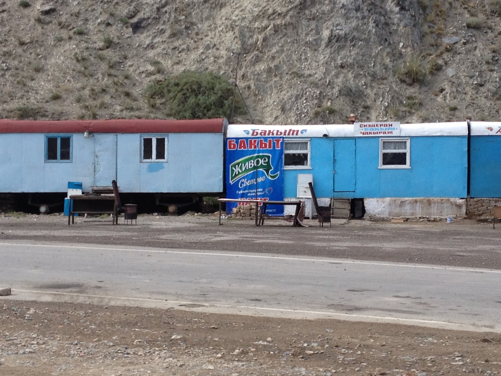 Eisenbahnwagen als Laden und Restaurant