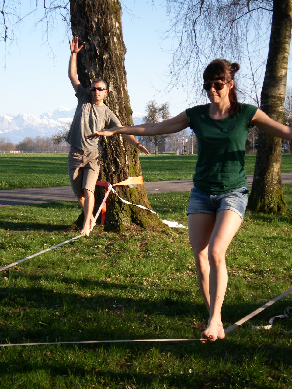 Team members slacklining