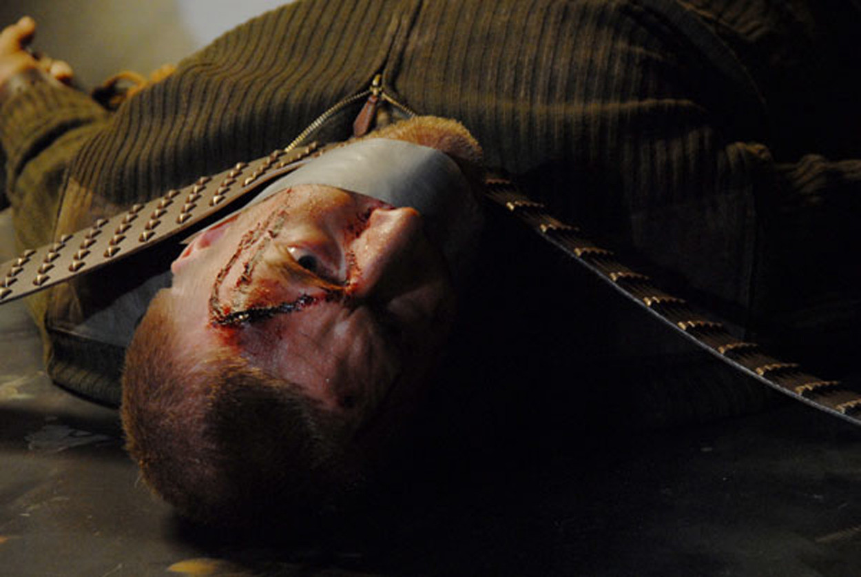 Ottaviano Blitch actor, action scene, cinematic with fake blood wound makeup, attore drammatico Fred in Shadow, torture scene, cinema
