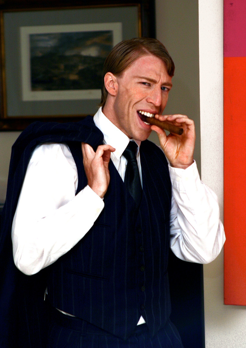 Ottaviano Blitch, actor and performer, characterful editorial portrait in waistcoat and tie holding a cigar, attore performer ritratto editoriale