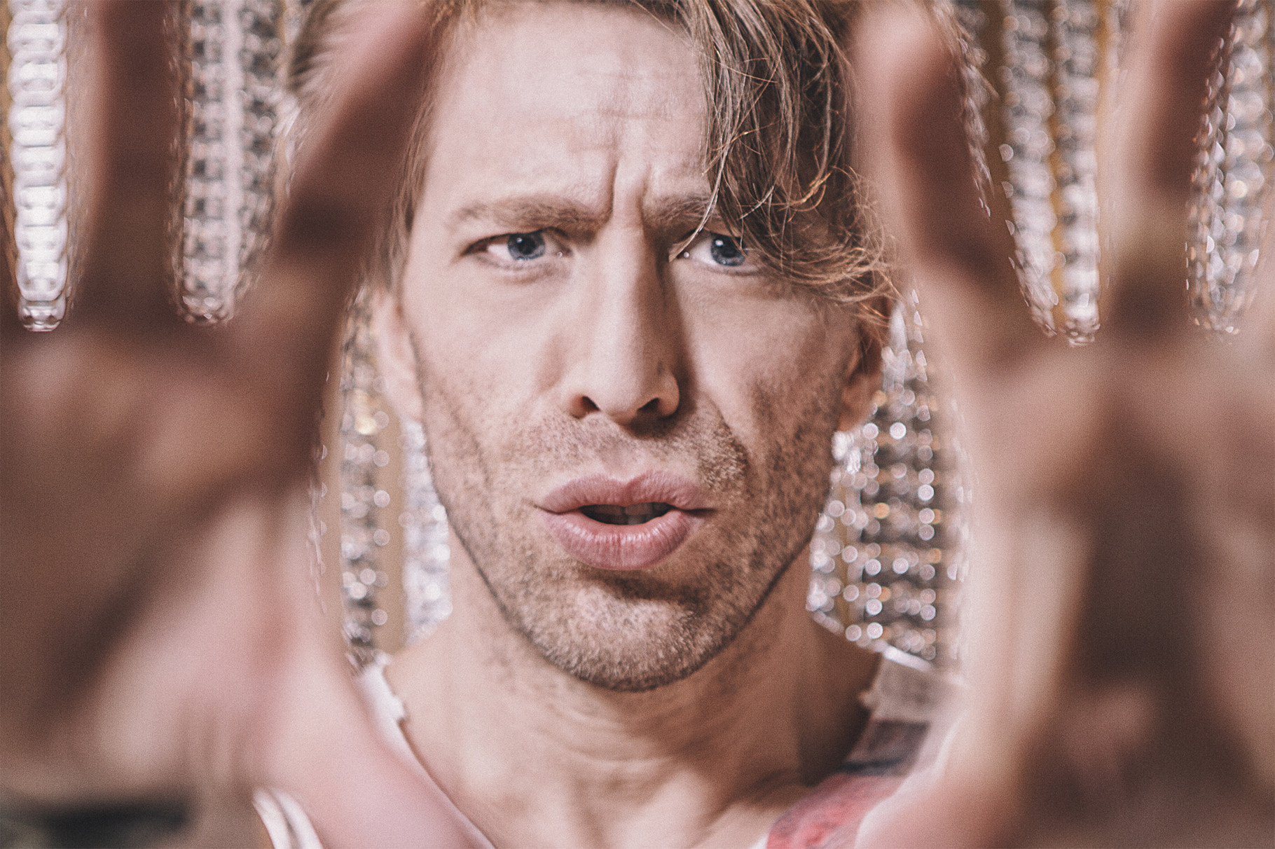 Ottaviano Blitch, Italian actor and performer, conceptual artistic close-up portrait framed by hands and pearls, attore performer italiano ritratto artistico concettuale