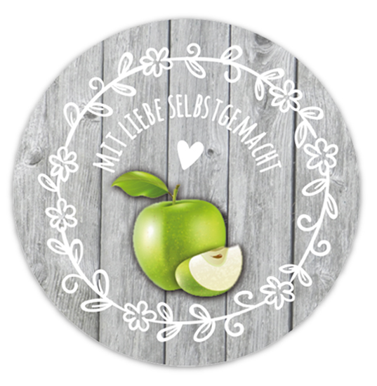 Einmachetiketten - Konfitüre - mit grauem Holzhintergrund, weißen Blumenornament und Herz mit einem grünem Apfel - Text: Mit Liebe selbstgemacht