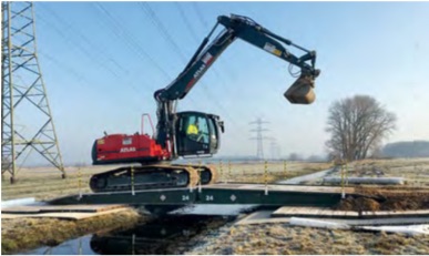 Kettenbagger Freileitungsbau