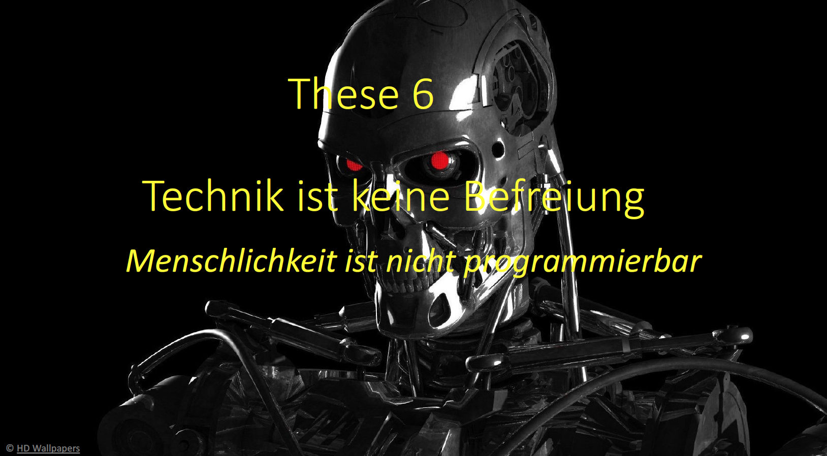 6. These-  Technik ist keine Befreiung. Menschlichkeit ist nicht programmierbar.