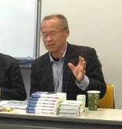 講演する米山俊哉さん