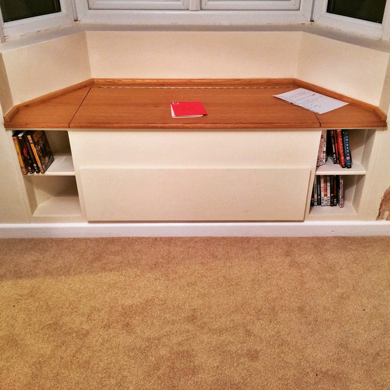 Bespoke bay window storage seat with Oak top