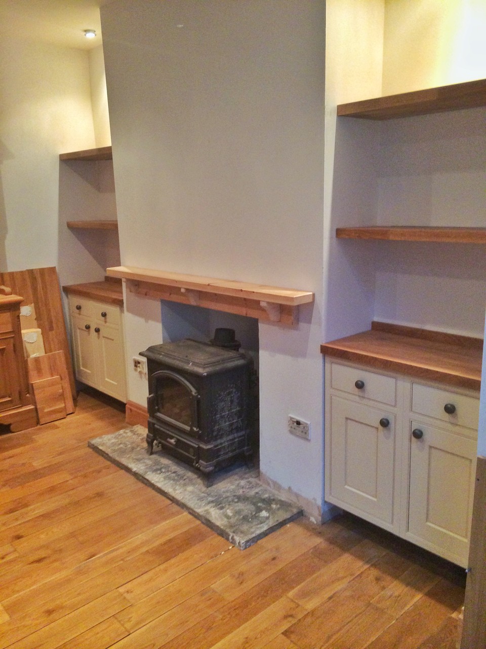 Solid oak floating shelves with fitted alcove units