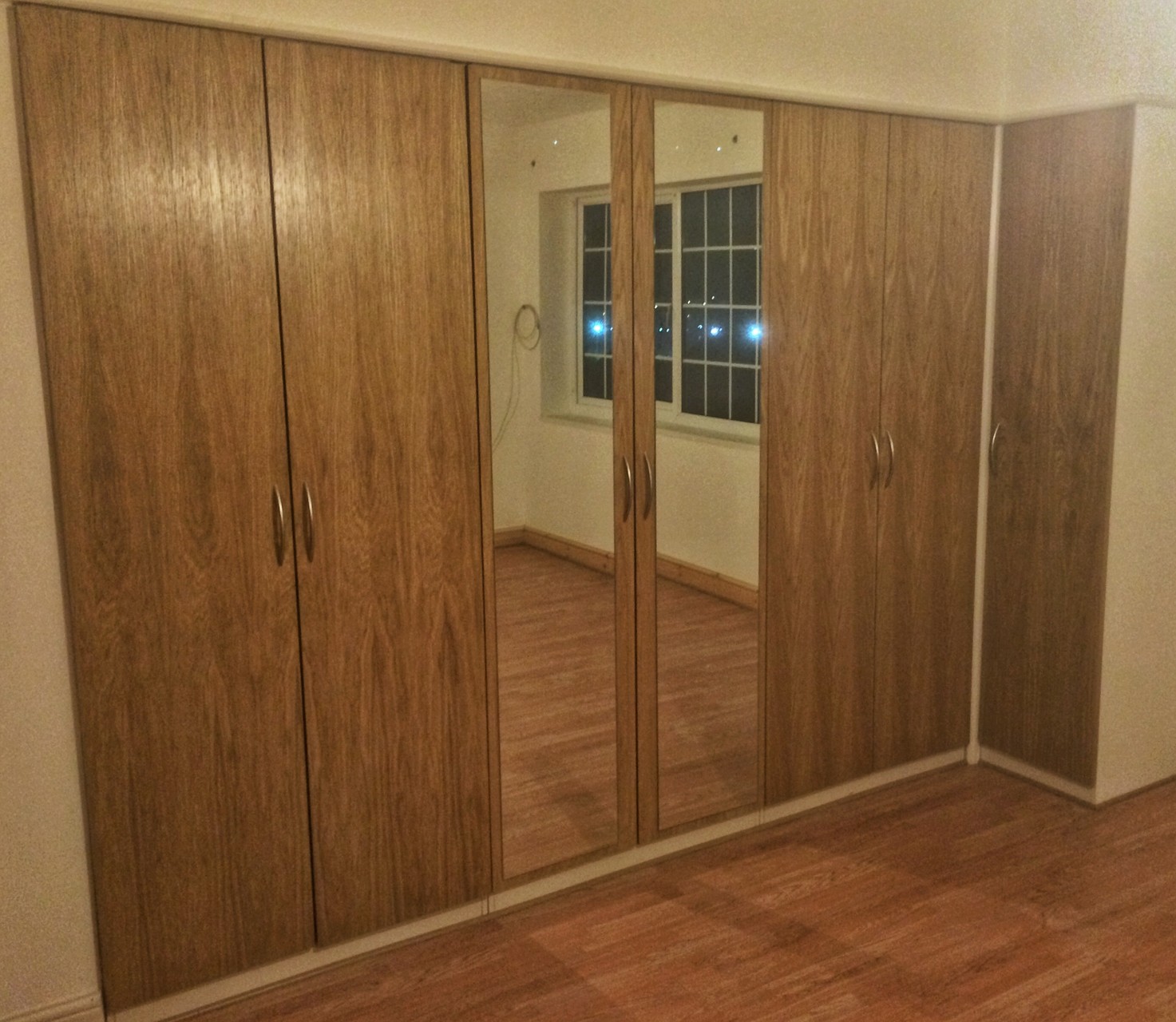 Bespoke wardrobe doors made from Oak veneered MDF