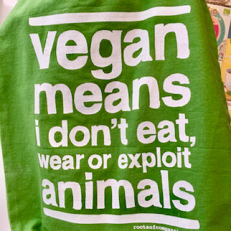 vegan bag from roots of compassion "vegan means i don't eat, wear or exploit animals"