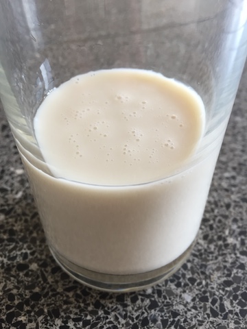 Glass of pea milk