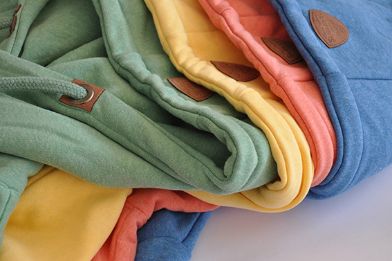 Fotografie von vier Kapuzen von Münster Hoodies. Funkenflug Design aus Münster für "Münster Souvenirs".