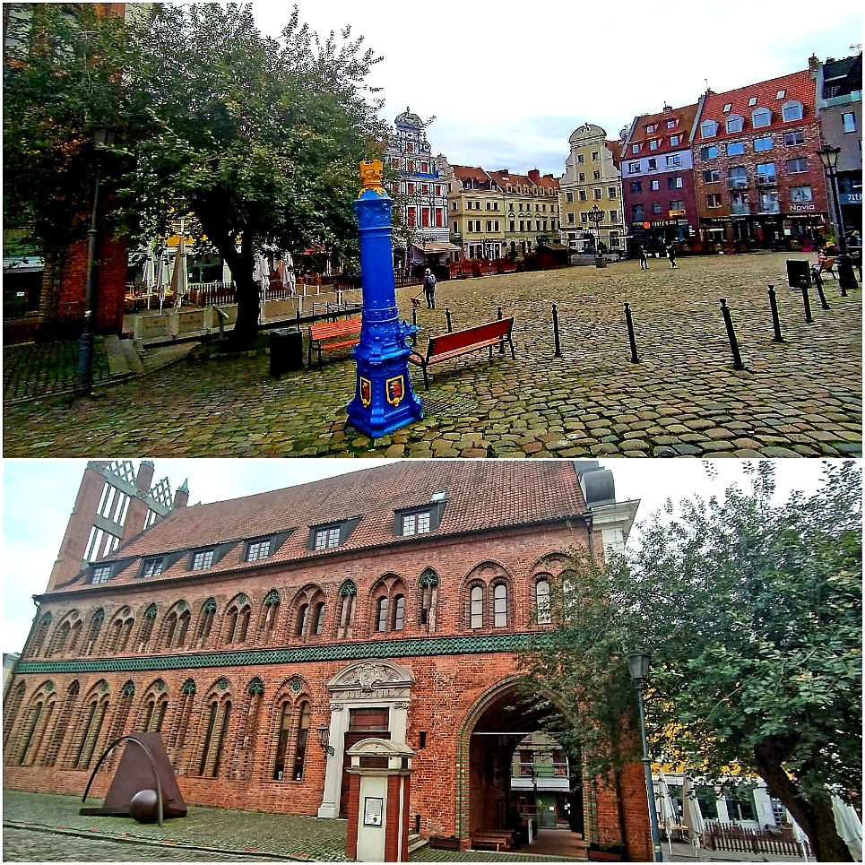 Altes Rathaus am hübschen Neumarkt, gesäumt von kunterbunten Häusern.