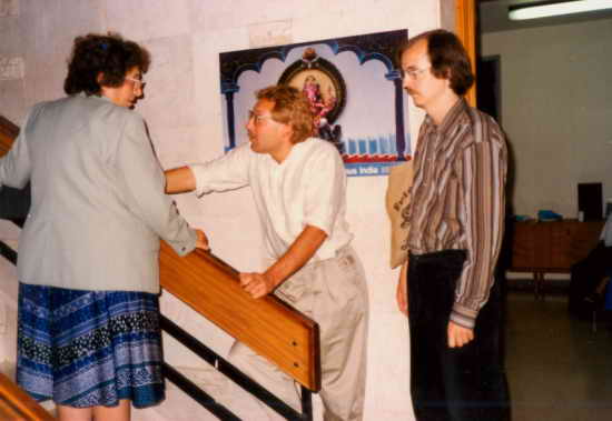   Peter Rühe (centre) talking with Dr. Isa Sarid, daughter of the niece of Dr. Hermann Kallenbach. Right: Christian Bartolf, Co-worker of Gandhi Information Centre, Berlin. Photograph: Nurit Moalim