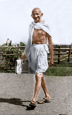 Mahatma Gandhi walking at Satyagraha Ashram, Sevagram, 1945.