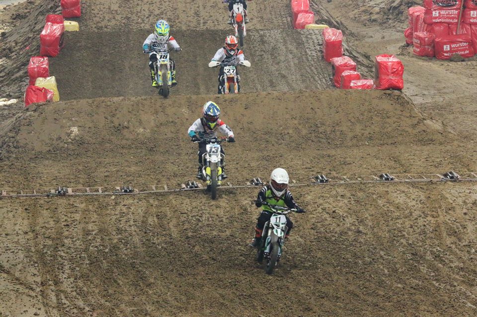 The boys try o catch the fastest lady on the only e-bike in the field.