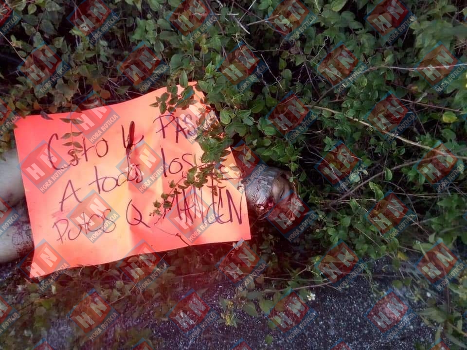 El cuerpo portaba una narco cartulina.