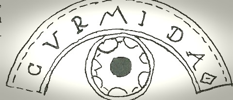 Époque gallo-romaine, les glyphes étaient remplacés par des lettres grecs. La roue de huit est encore là, il y a huit inscriptions qui forment un mot. Avec les glyphes, cela peut composer une phrase, comme une prière en rond.