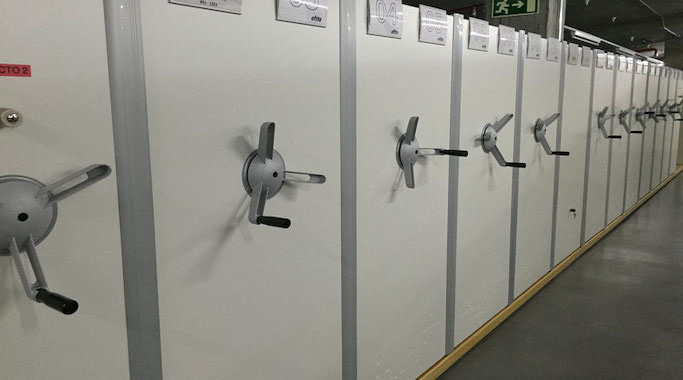 How to retrieve an artists' book in the future when it’s stored in one of the hundreds acid-free boxes in one of these cabinets?