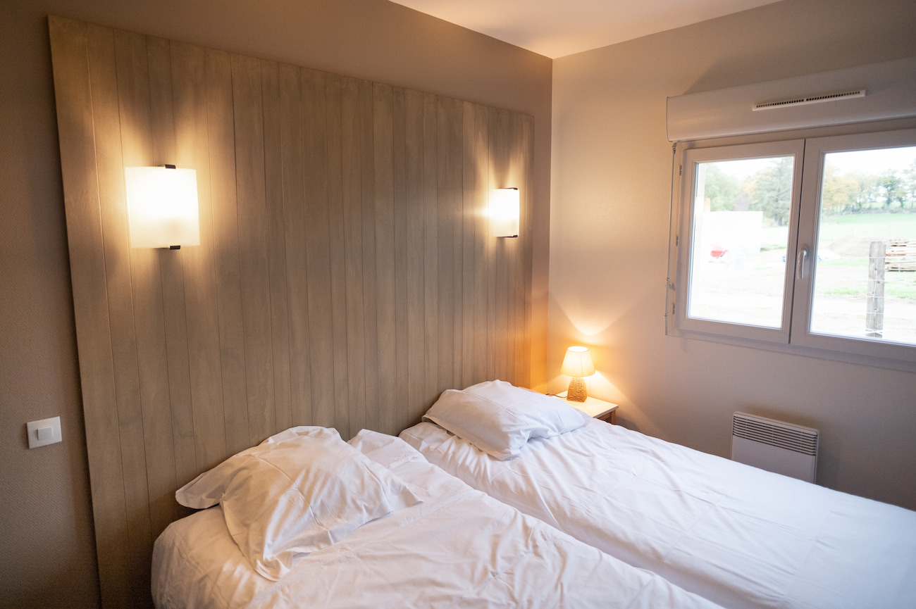chambre Twin d'un gîte 4 personnes, 2 lits simples, gîte de pêche en Nouvelle-Aquitaine